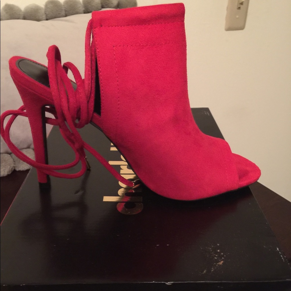 High heel booties never worn